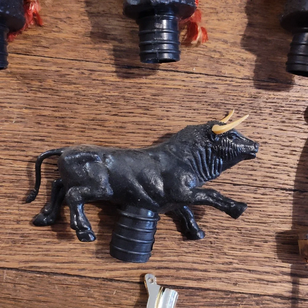 Lot Of vintage plastic bull head bottle pourer and stopper
